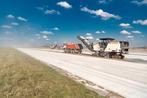 Trucks fixing airport runways