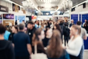 People walking around at a conference